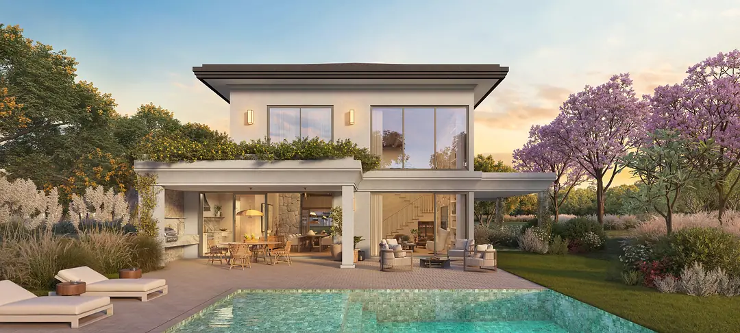 Fundos de casa do Villa Riviera com piscina privativa e jardim florido